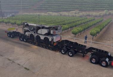 Long Oversized Trailer Magnitude 55l with a Load Offroad Crane