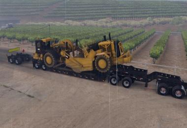 Long Oversized Trailer Magnitude 55l with a Load Scraper