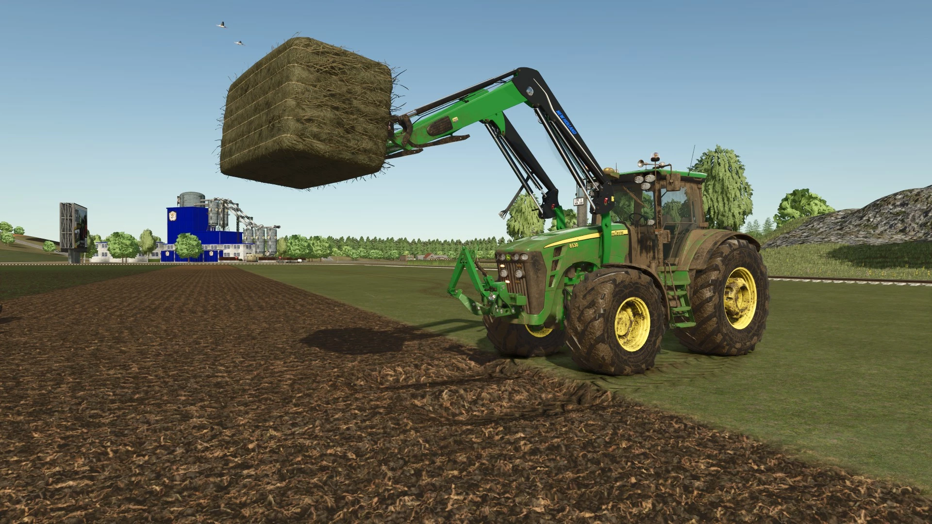 JD 8530 XTR avec chargeur
